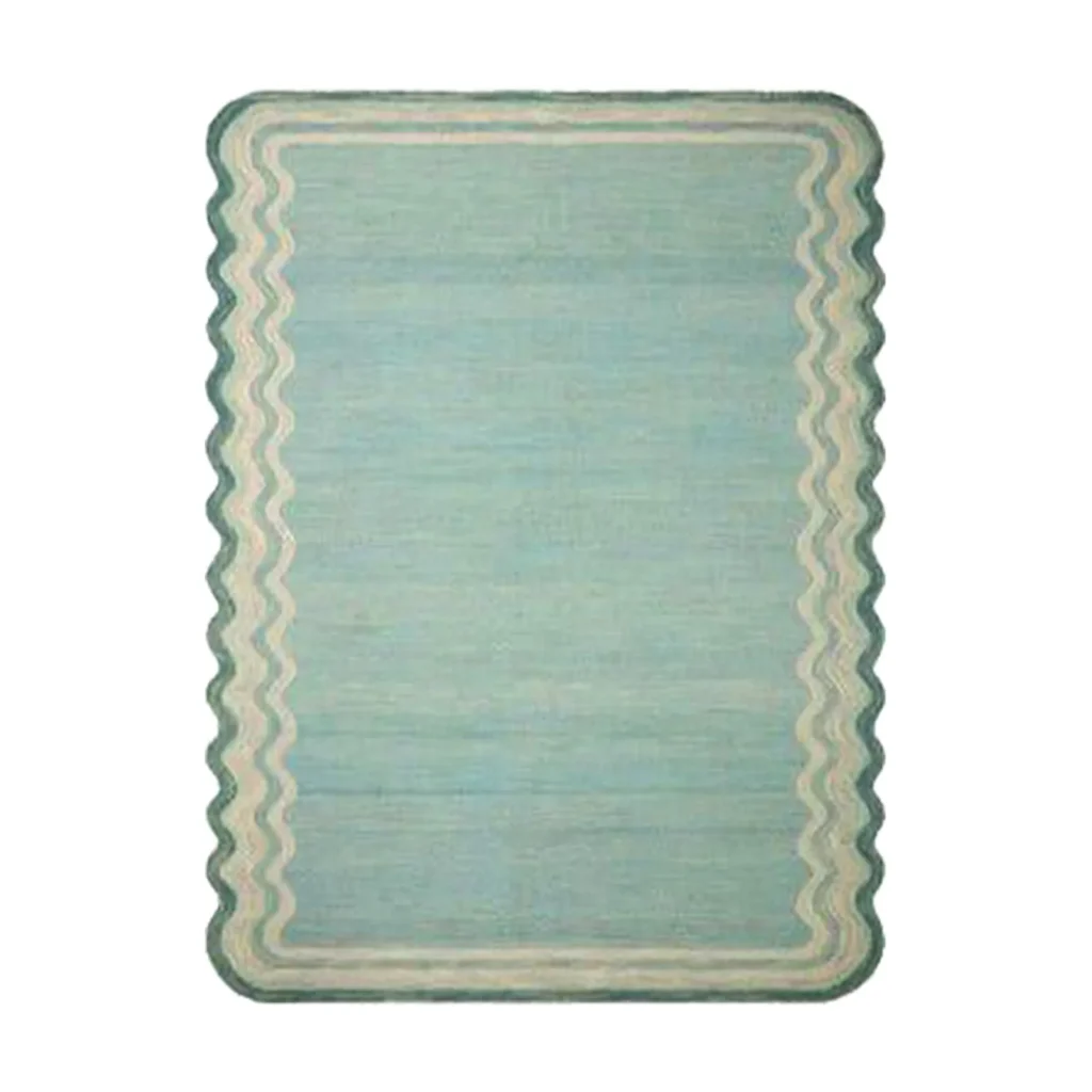Custom Wavy Edge Rug in Pale Aqua with Line Border — front view