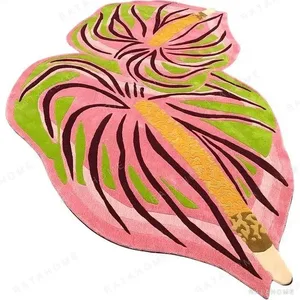 Custom Tropical Leaf Rug in Pink, Green and Burgundy — in a room setting