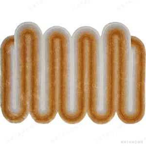 Custom Amber Squiggle Rug with Cream Core in rust — in a room setting