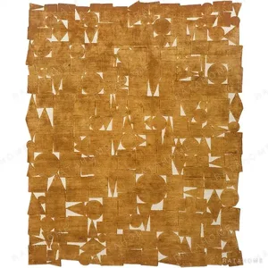 Custom Amber Mosaic Rug with Torn Edge in rust — in a room setting