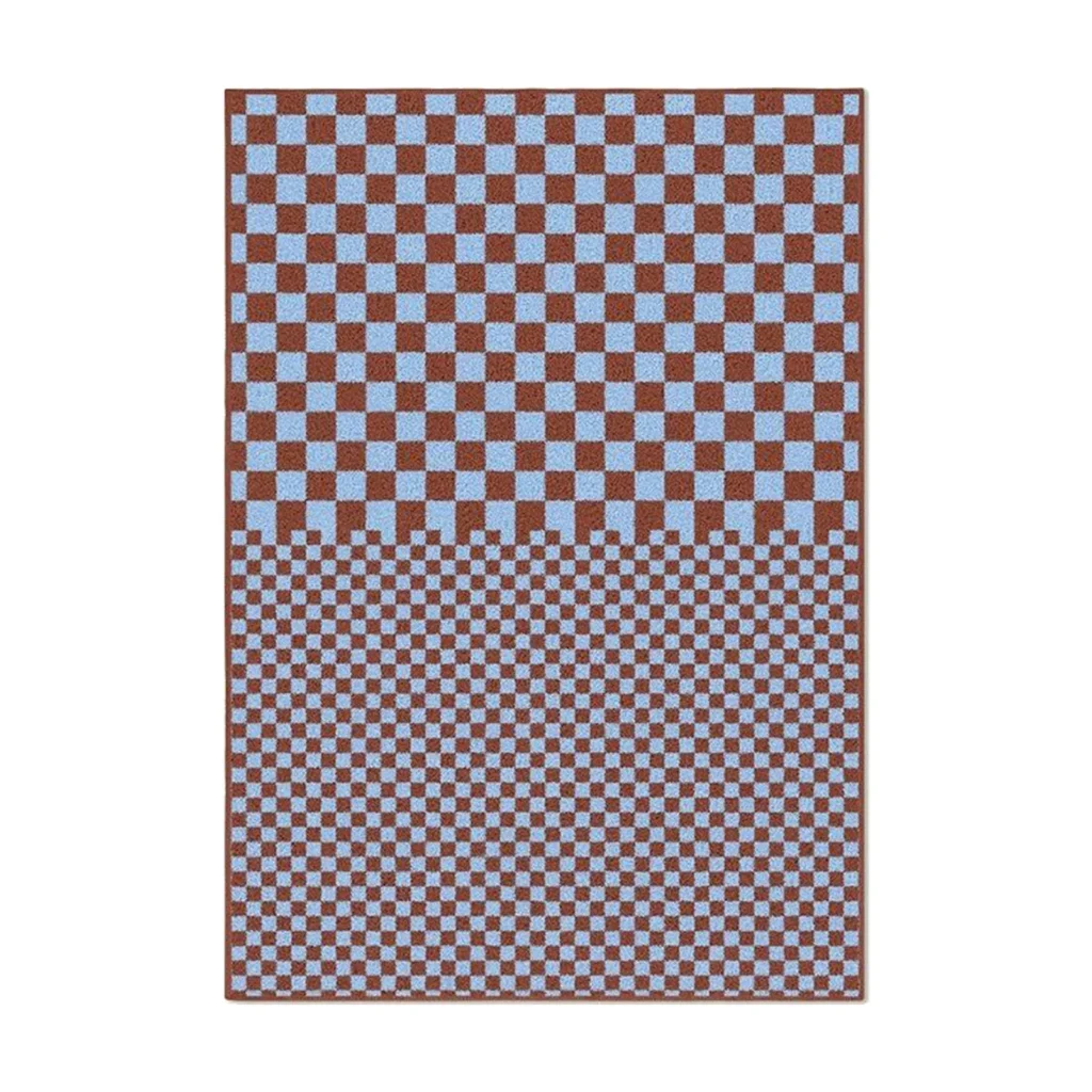 Custom Two-Scale Checkerboard Rug in Rust and Sky Blue — front view
