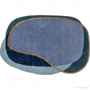 Custom Layered Pebble Rug in Blue, Teal and Rust Line — in a room setting