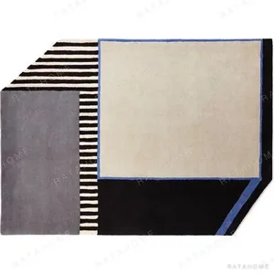 Custom Geometric Panel Rug in Cream, Grey, Black and Stripe — in a room setting