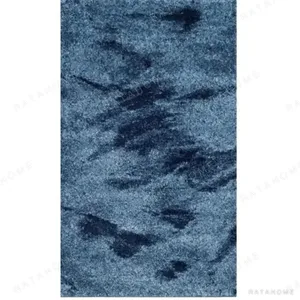 Custom Indigo Ink Blot Rug in blue — in a room setting