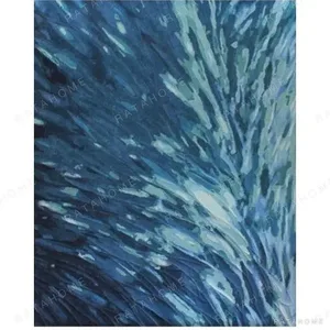 Custom Blue Feather Burst Rug in Navy and Teal — in a room setting