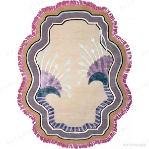 Custom Shell Frame Rug in Cream, Purple and Pink with Fringe — in a room setting