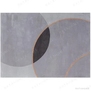 Custom Grey Rug with Overlapping Circles and Copper Lines in slate — in a room setting
