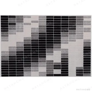 Custom Pixel Grid Rug in Black, Grey and Cream — in a room setting