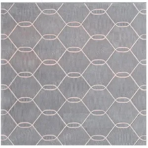 Custom Honeycomb Trellis Rug in Blue-Grey and Blush — in a room setting