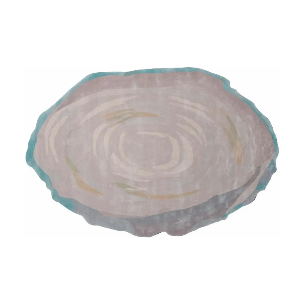 Custom Tree Ring Rug in Taupe with Teal Edge — front view