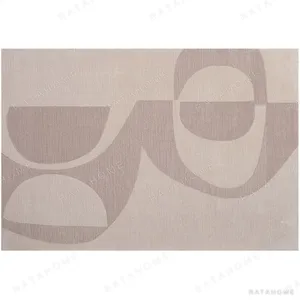 Custom Tonal Arc Rug in Sand and Taupe — in a room setting