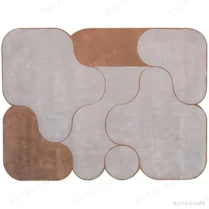 Custom Rounded Block Rug in Grey, Terracotta and Taupe — in a room setting