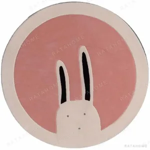 Custom Round Peeking Rabbit Rug in Pink and Cream — in a room setting