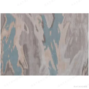Custom Water Reflection Rug in Grey, Blue and Sand — in a room setting
