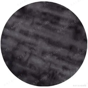 Custom Round Distressed Rug in Charcoal — in a room setting