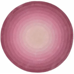 Custom Round Gradient Rug in Raspberry and Blush — in a room setting