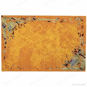 Custom Distressed Rug in Saffron Orange with Painted Edge — in a room setting