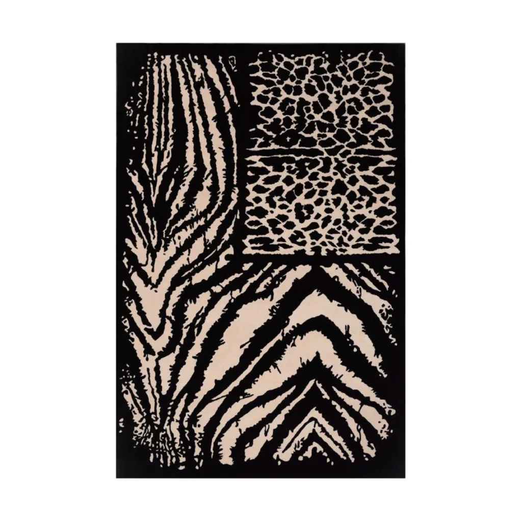 Custom Patchwork Animal Print Rug in Black and Cream — front view