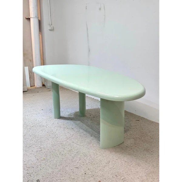Mint Green Lacquered Oval Desk with Column Legs in olive — in a room setting