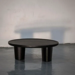 Round Black Wood Coffee Table on Sculpted Pedestal in black — front view