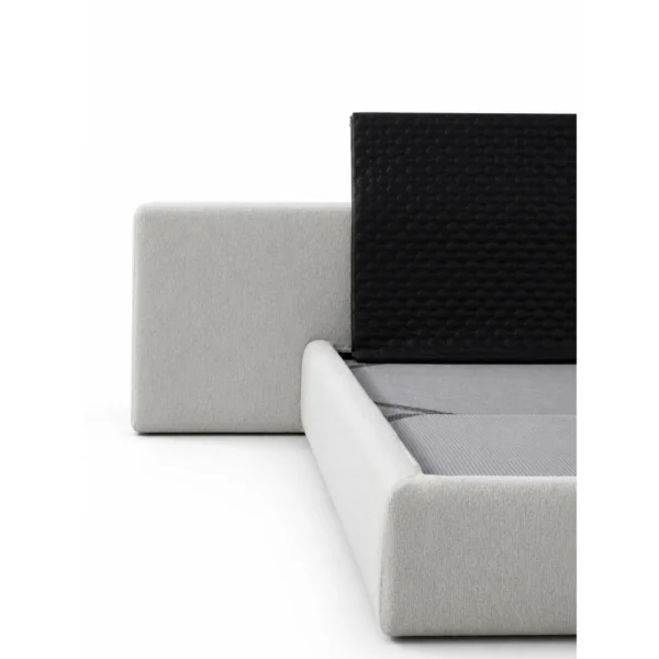 Custom Low Upholstered Bed with Bolster Cushions in oatmeal — in a room setting