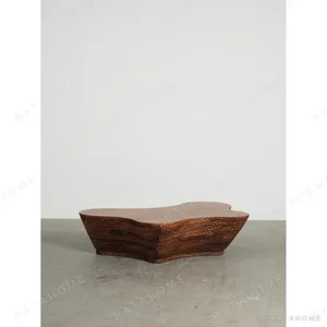 Carved Walnut Boulder Coffee Table, 160 x 100 cm in walnut — in a room setting
