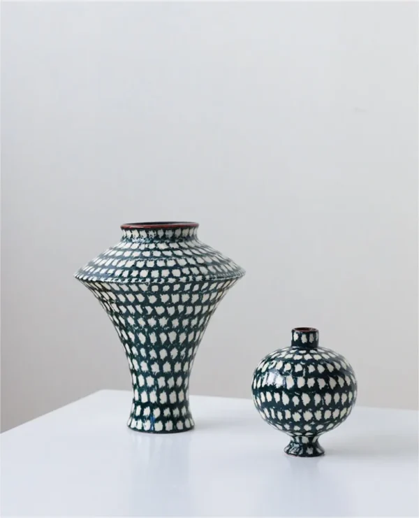 Artist-Made Teal Grid Flared Urn Vase in olive — in a room setting