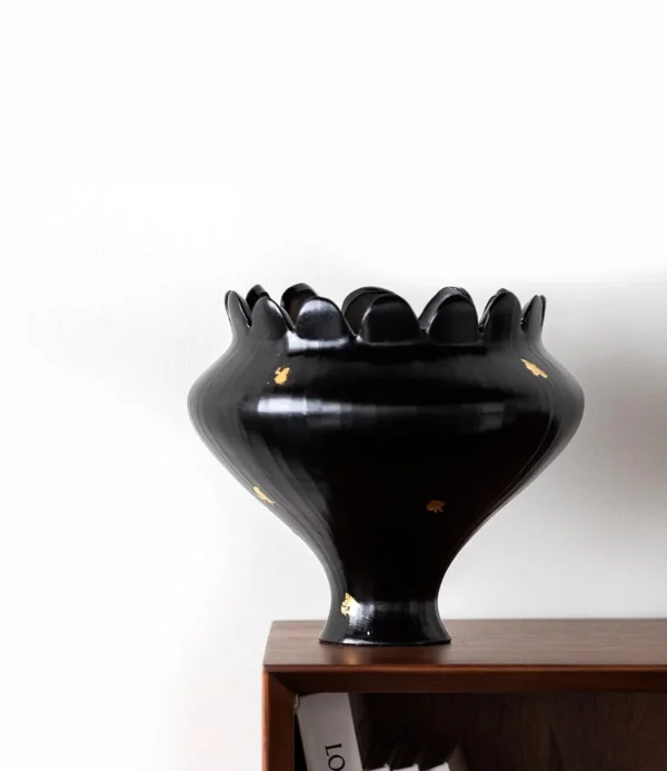 Artist-Made Black Petal-Rim Bowl Vase with Gold Flecks in black — in a room setting