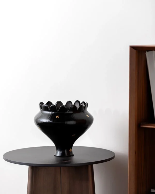 Artist-Made Black Petal-Rim Bowl Vase with Gold Flecks in black — in a room setting