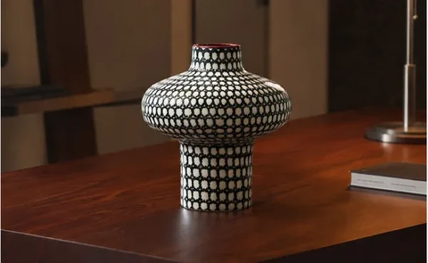 Artist-Made Black and White Grid Mushroom Vase with Red Rim in black — in a room setting