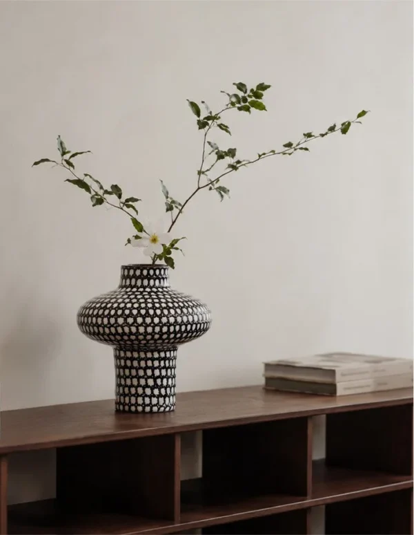 Artist-Made Black and White Grid Mushroom Vase with Red Rim in black — in a room setting