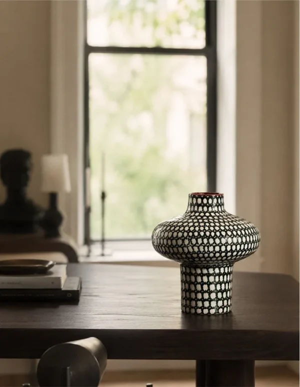 Artist-Made Black and White Grid Mushroom Vase with Red Rim in black — in a room setting