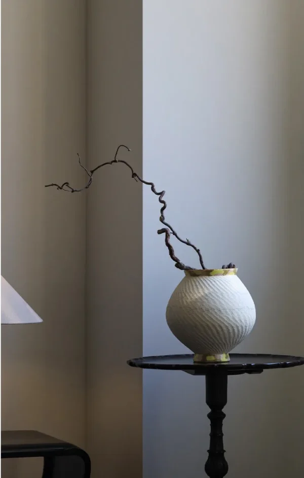 Artist-Made Two-Tone Combed Moon Jar with Gilded Foot in ivory — in a room setting