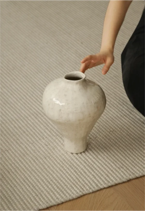 Artist-Made White Slip Combed Urn Vase, Medium in ivory — in a room setting