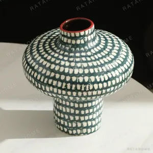 Artist-Made Teal Grid Spinning-Top Vase with Red Rim, Medium in olive — front view