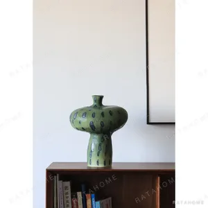 Artist-Made Green Spotted Mushroom Vase with Small Neck in olive — in a room setting