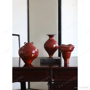 Designer Jingdezhen Red Lacquer-Glaze Vases with Gold Leaf in red — in a room setting