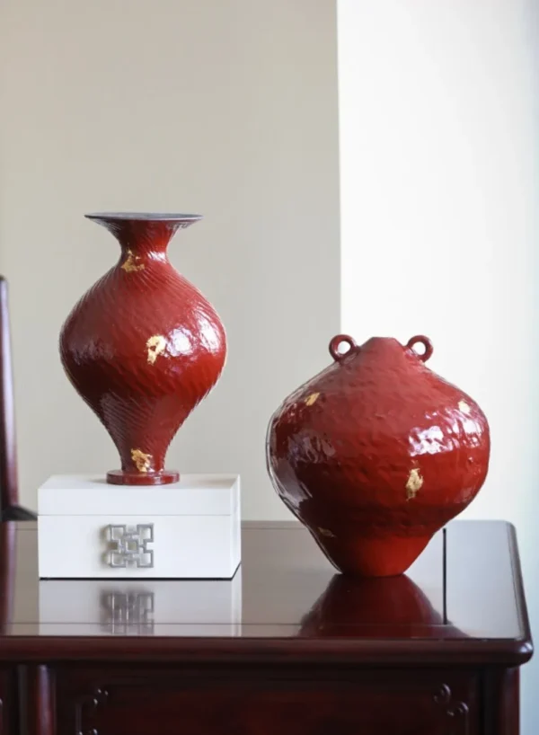 Designer Jingdezhen Red Lacquer-Glaze Vases with Gold Leaf in red — in a room setting