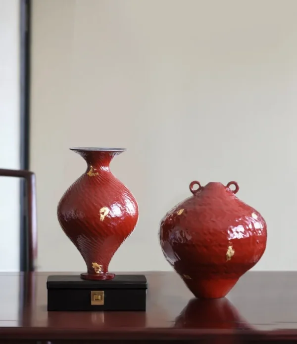 Designer Jingdezhen Red Lacquer-Glaze Vases with Gold Leaf in red — in a room setting