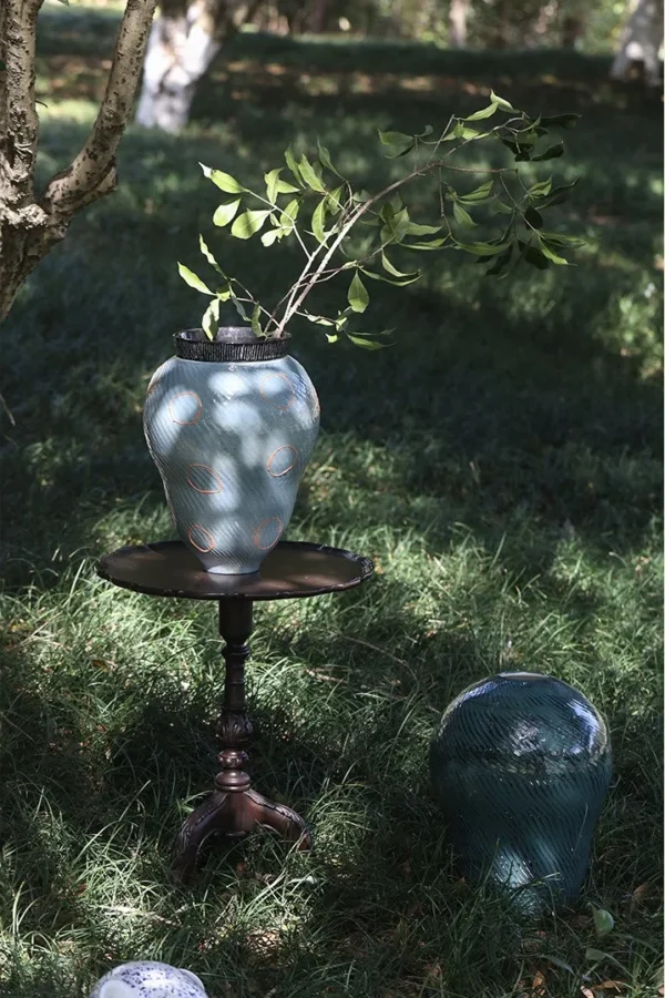 Designer Jingdezhen Glossy Blue Twisted Rib Jar Vase, Large in blue — in a room setting