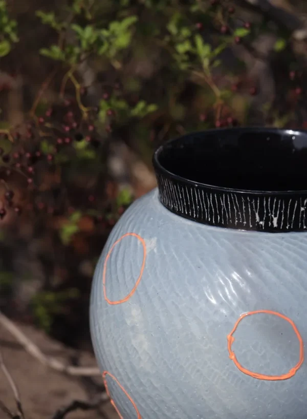 Designer Jingdezhen Glossy Blue Twisted Rib Jar Vase, Large in blue — in a room setting