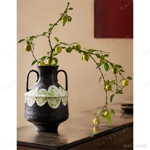 Artist-Made Twin-Handle Black Amphora Vase in black — in a room setting