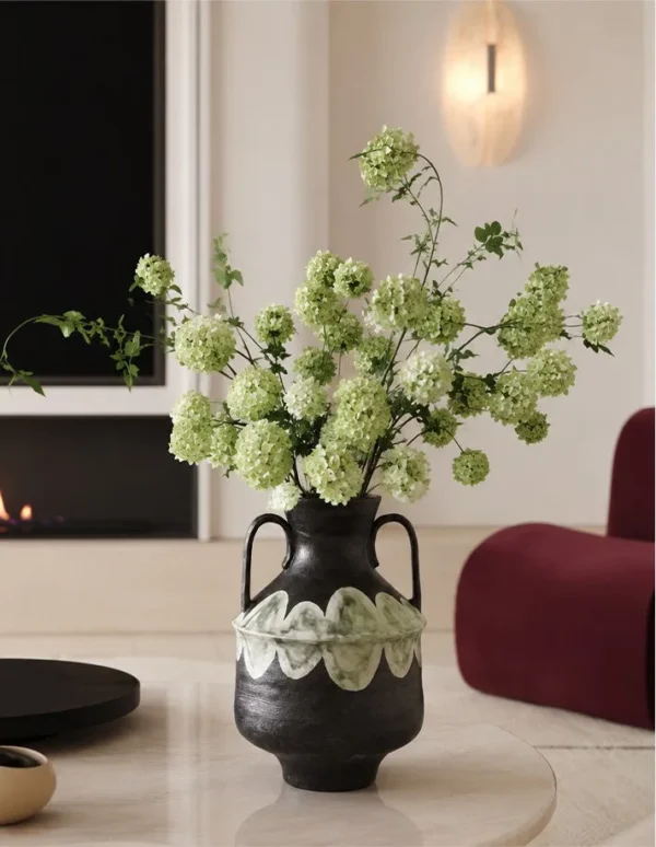 Artist-Made Twin-Handle Black Amphora in black — in a room setting