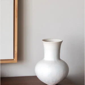 Artist-Made Mist Blue Flow Glaze Long-Neck Vase in ivory — in a room setting