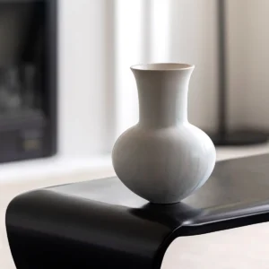 Artist-Made Mist Blue Flow Glaze Long-Neck Vase in ivory — in a room setting