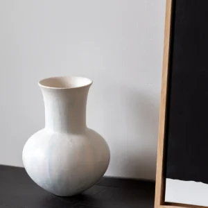 Artist-Made Mist Blue Flow Glaze Long-Neck Vase in ivory — in a room setting