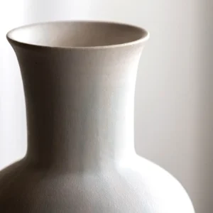 Artist-Made Mist Blue Flow Glaze Long-Neck Vase in ivory — in a room setting