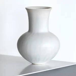 Artist-Made Mist Blue Flow Glaze Long-Neck Vase in ivory — in a room setting