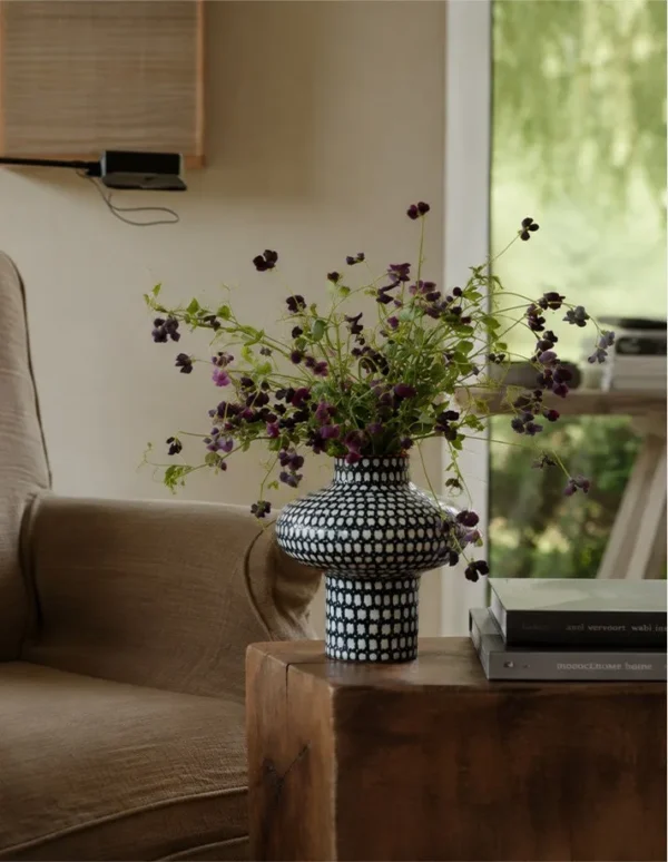 Artist-Made Hand-Painted Grid Mushroom Vase, Living Room in black — in a room setting