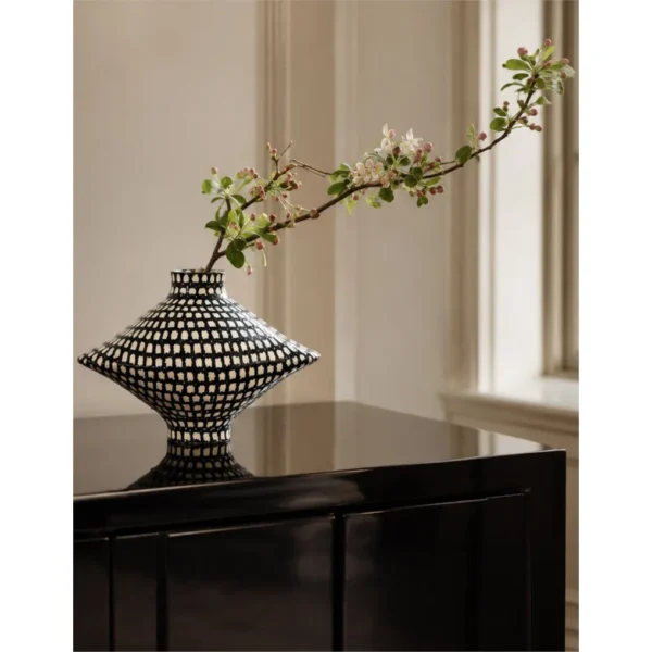 Artist-Made Hand-Painted Checkered Lens Vase in black — in a room setting